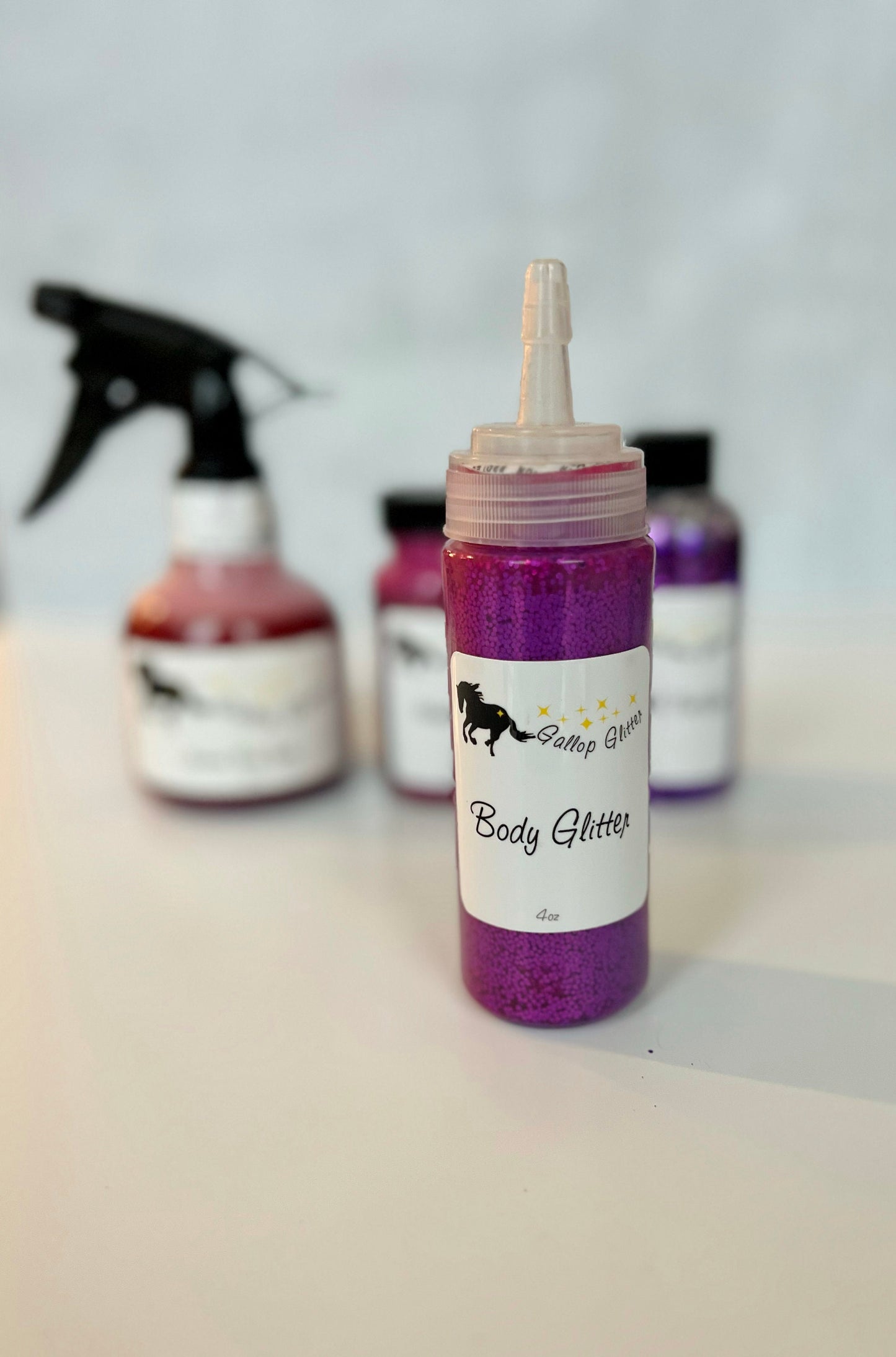 Purple Gallop Glitter set with Body Glitter in foreground