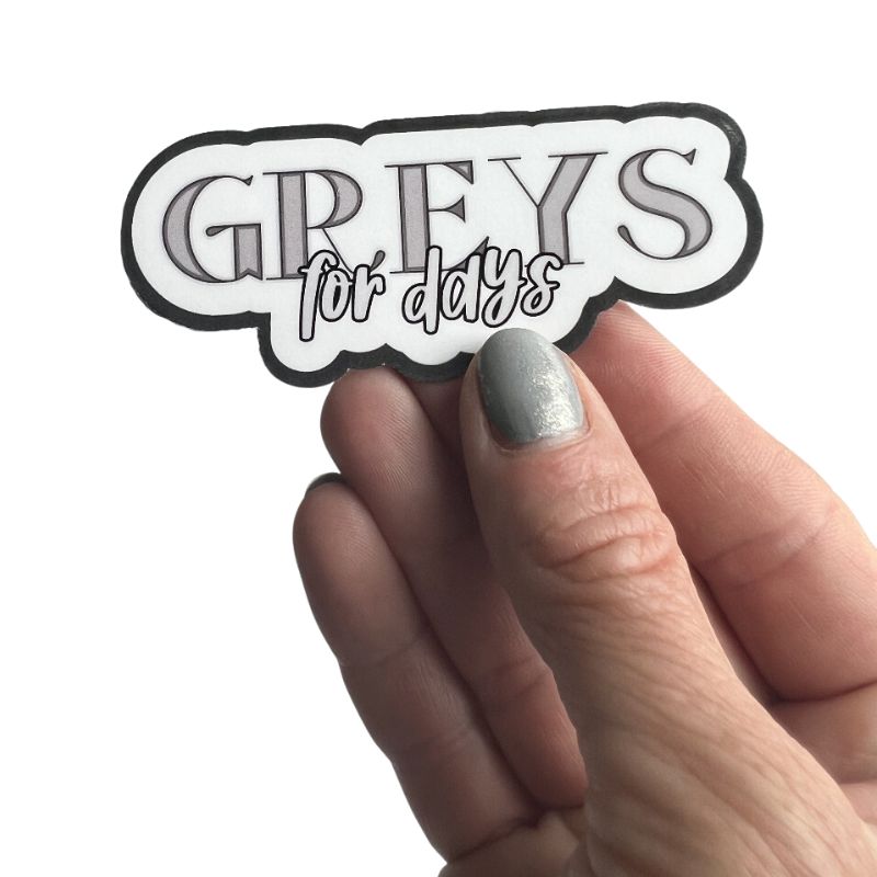 Greys for Days sticker in hand