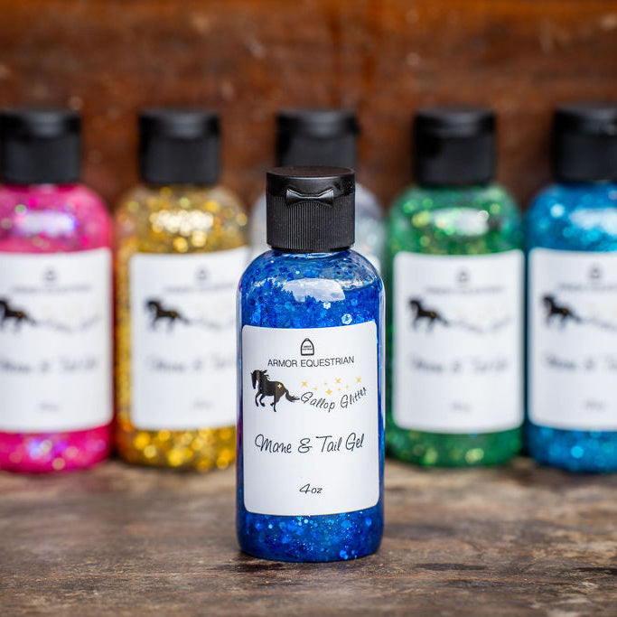 Colorful bottles of horse grooming gel on a wooden surface with a wooden background.