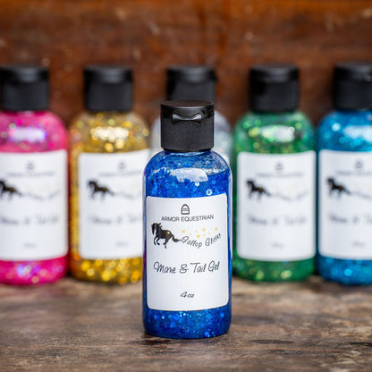 Colorful bottles of horse grooming gel on a wooden surface with a wooden background.