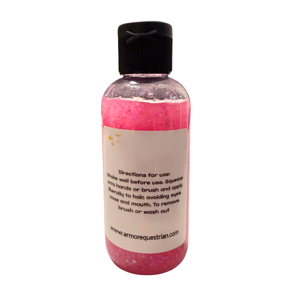 Bottle of pink liquid with black cap on a white background