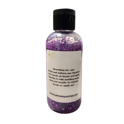 Bottle of purple liquid with a black cap on a white background
