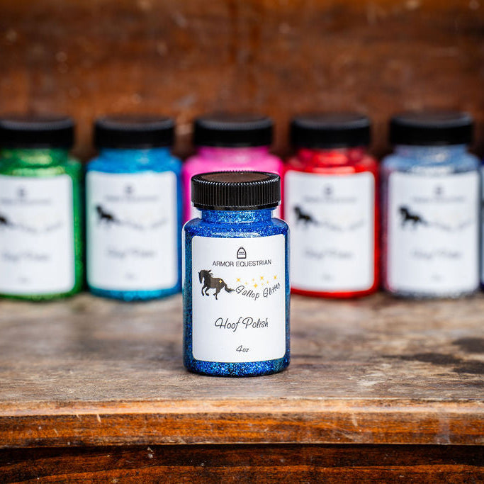 Assorted ink bottles on a wooden surface with a rustic background