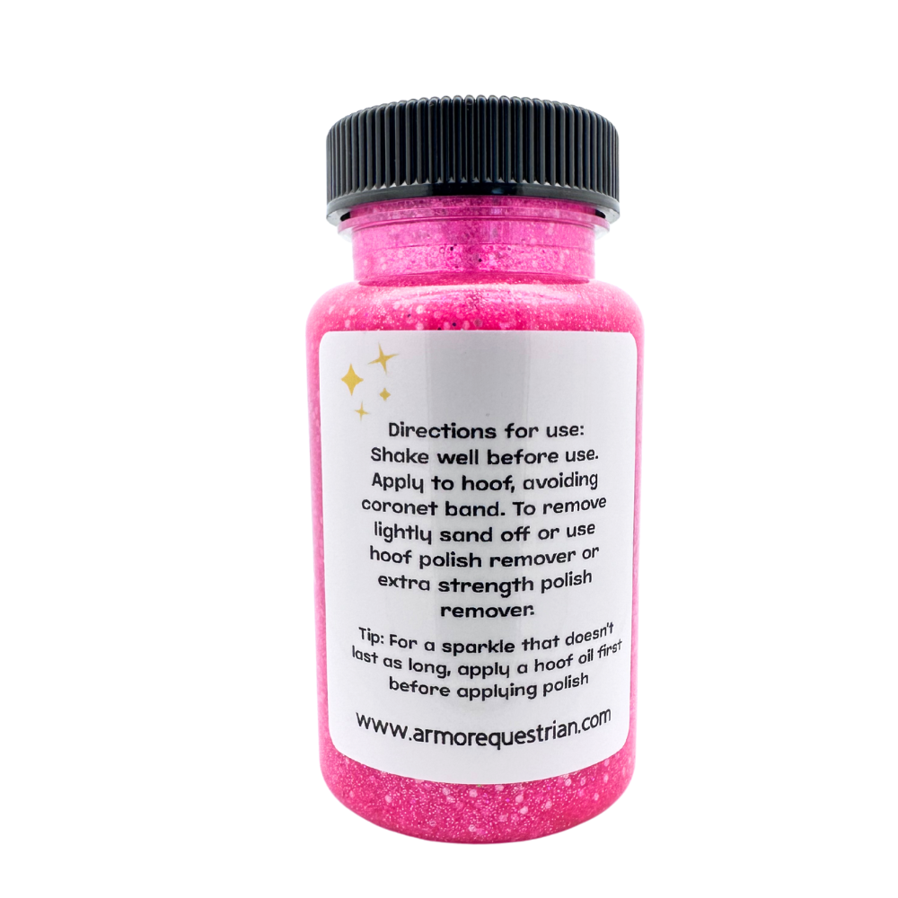 Pink glittery hoof polish bottle with black cap on white background