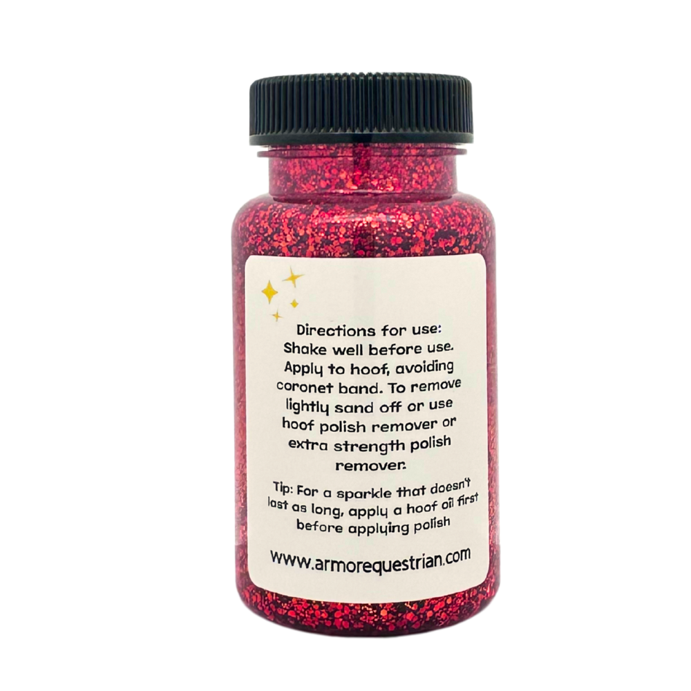 Bottle of red glitter with label on white background